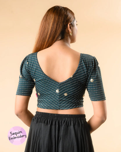 Damini bottle green blouse showing the V-back with chevron stripes by Advi - back