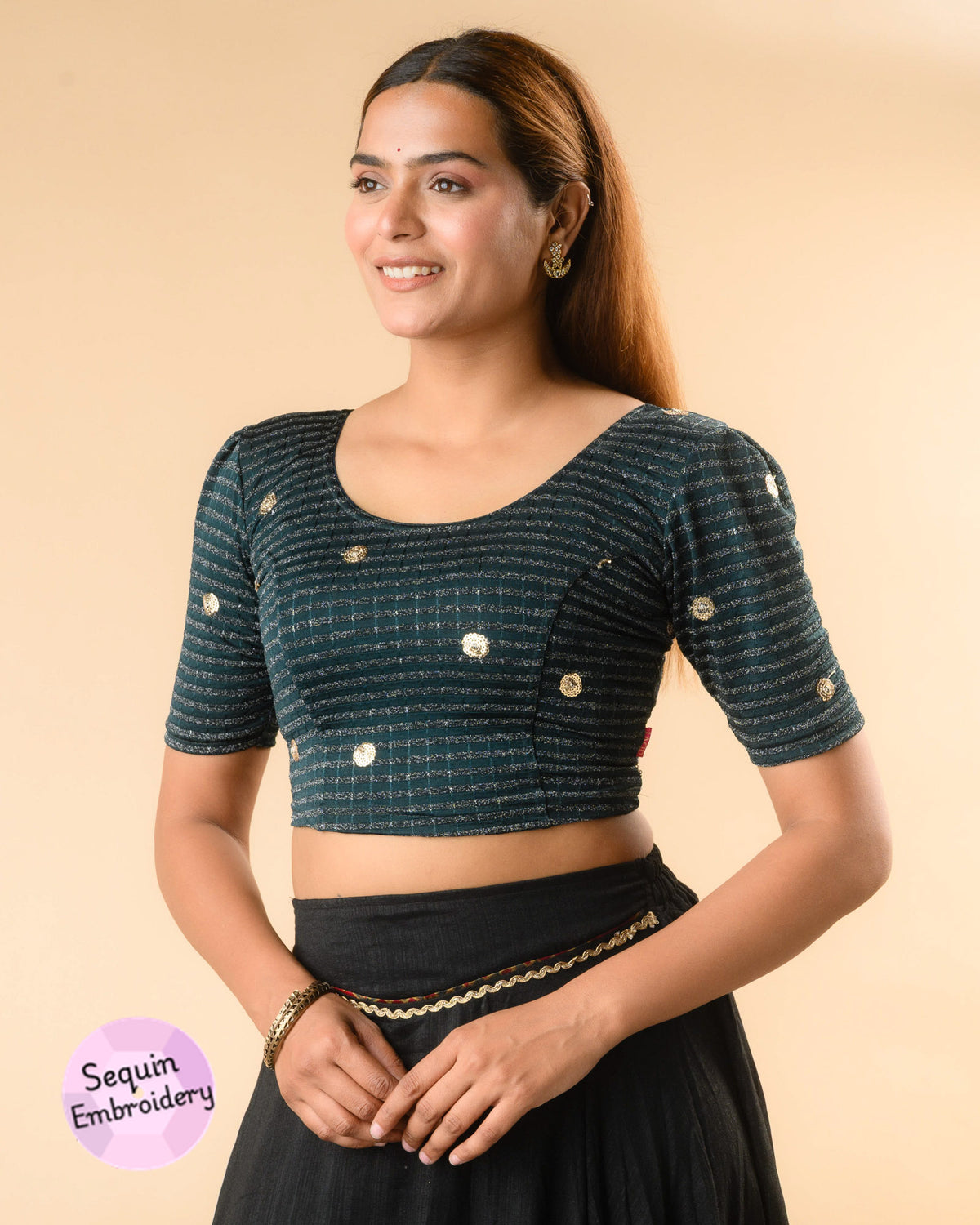 Damini bottle green blouse showing the soft puff sleeve by Advi - side