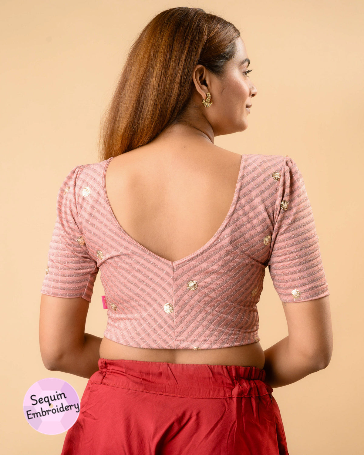 Damini light onion blouse showing the V-back with chevron stripes by Advi - back