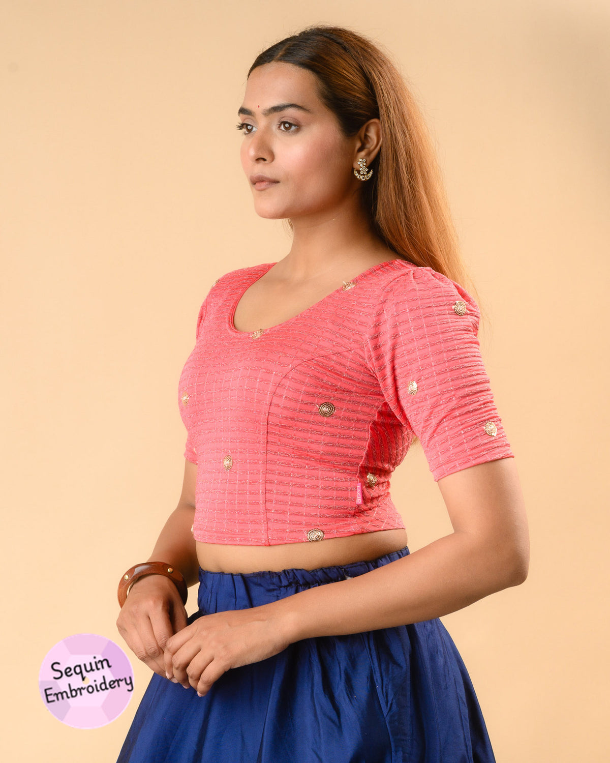 Damini peach blouse showing the soft puff sleeve by Advi - side