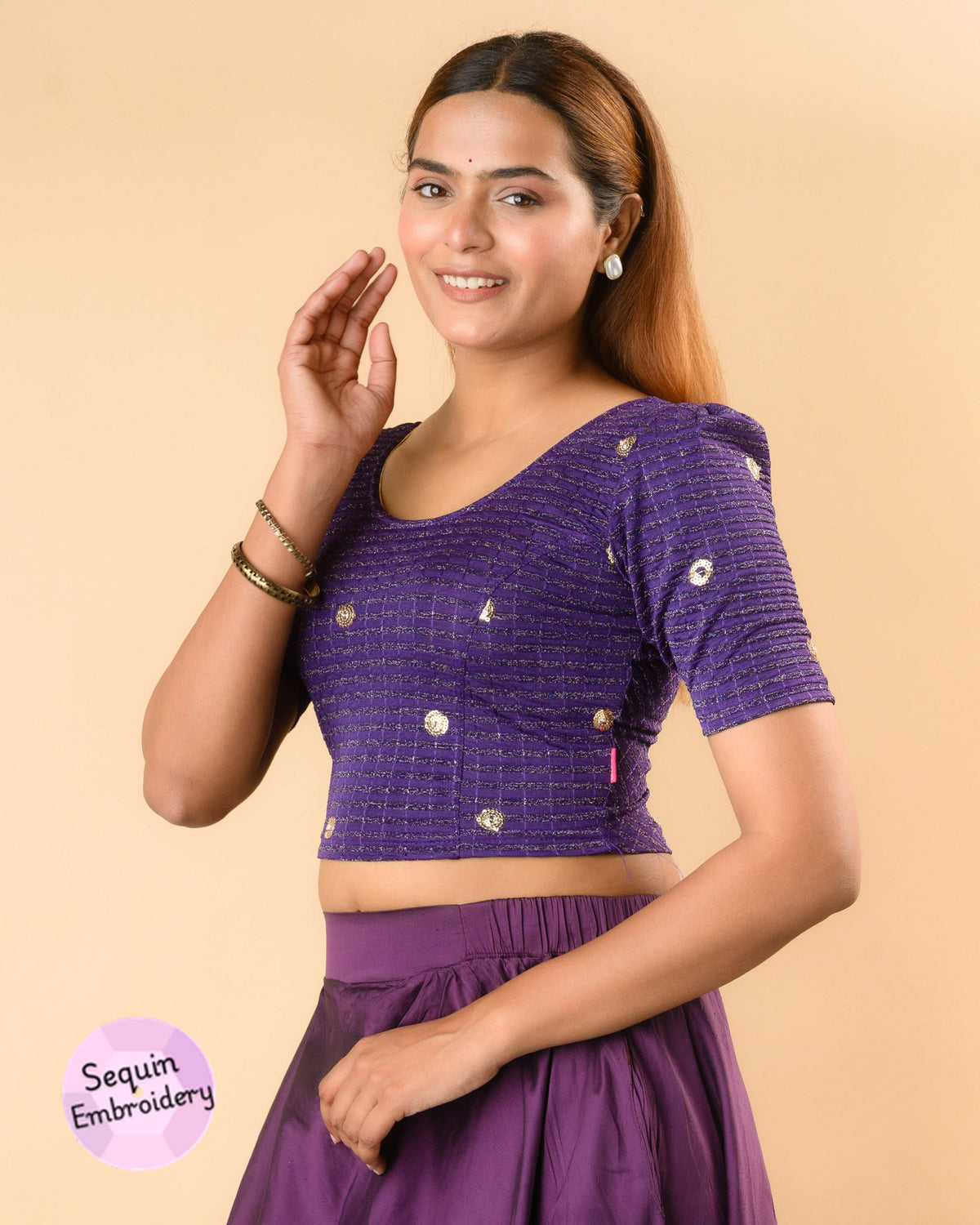 Damini purple blouse showing the soft puff sleeve by Advi - side