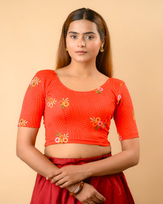 Jheeni red round neck blouse with multicolour resham floral buti by Advi - front
