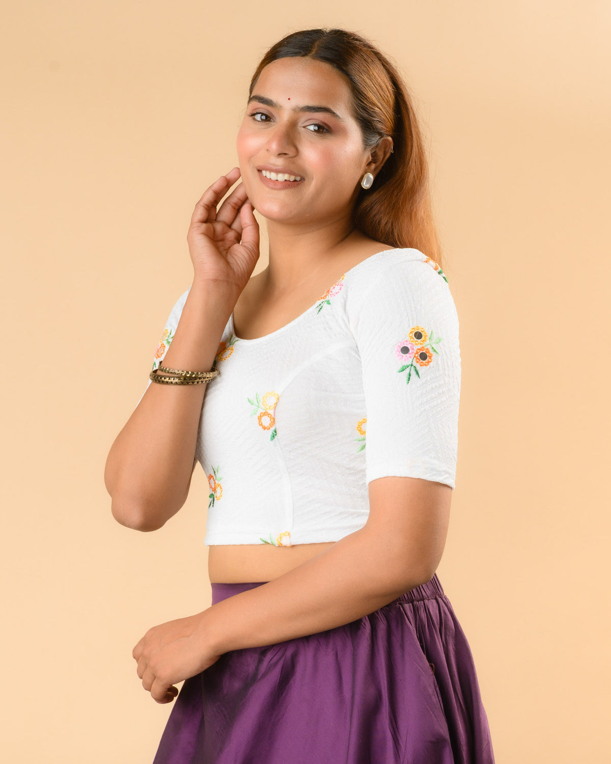 Jheeni white blouse side view with mirror work on the elbow sleeves by Advi - side