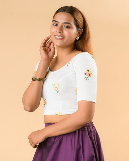 Jheeni white blouse side view with mirror work on the elbow sleeves by Advi - side