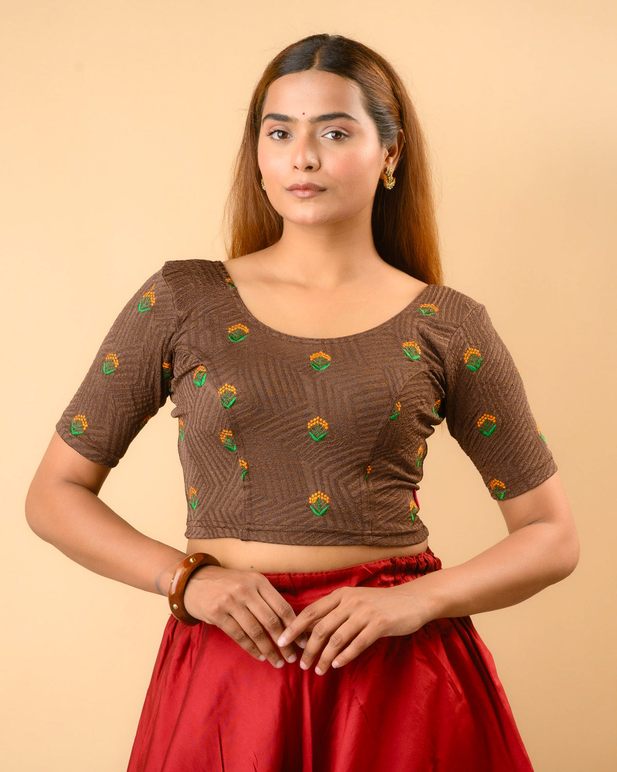 Keerti Coffee Potli Back Blouse with round neck and all over resham buti by Advi - front