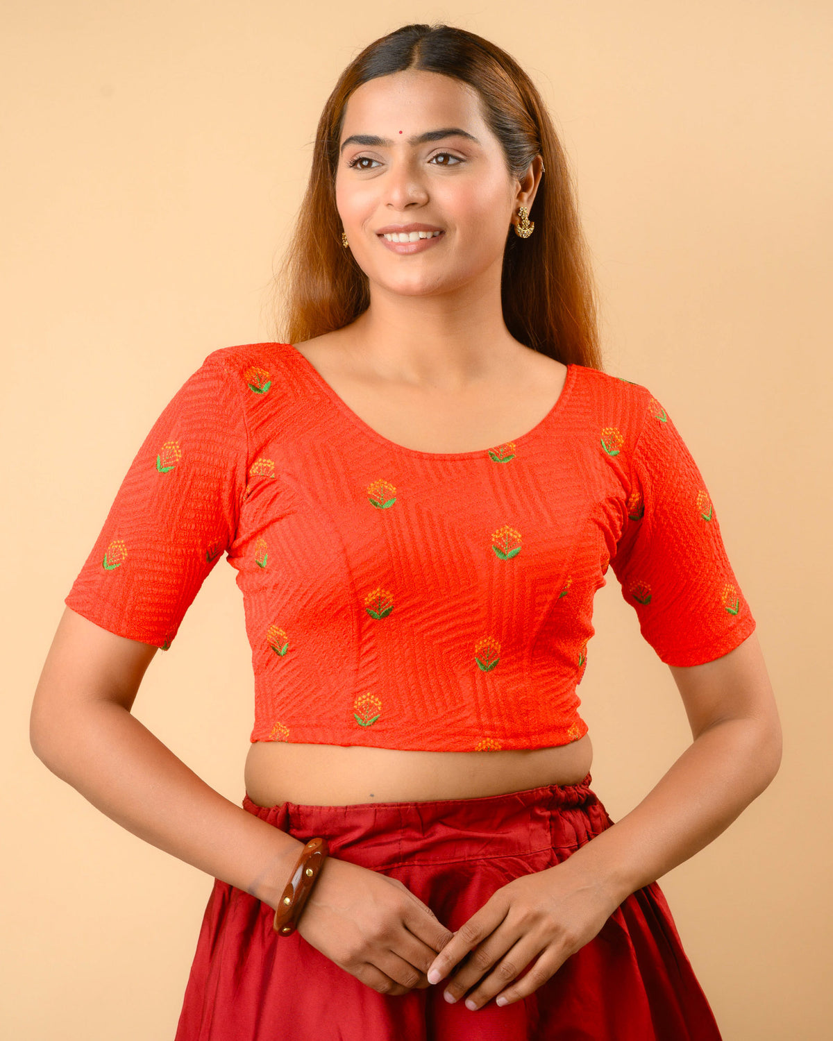 Keerti Red Potli Back Blouse with round neck and all over resham buti by Advi - front