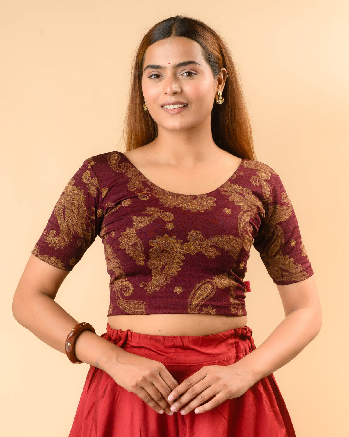 Keri wine foil print round neck blouse by Advi - front