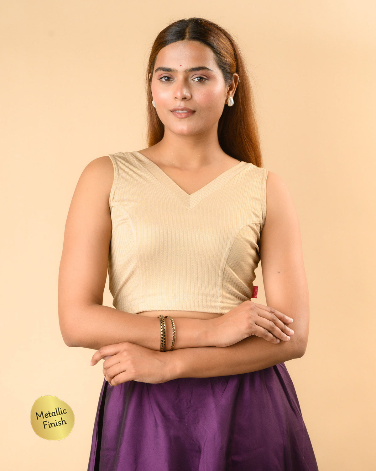 Shivani gold V neck sleeveless rib jacquard blouse by Advi - front
