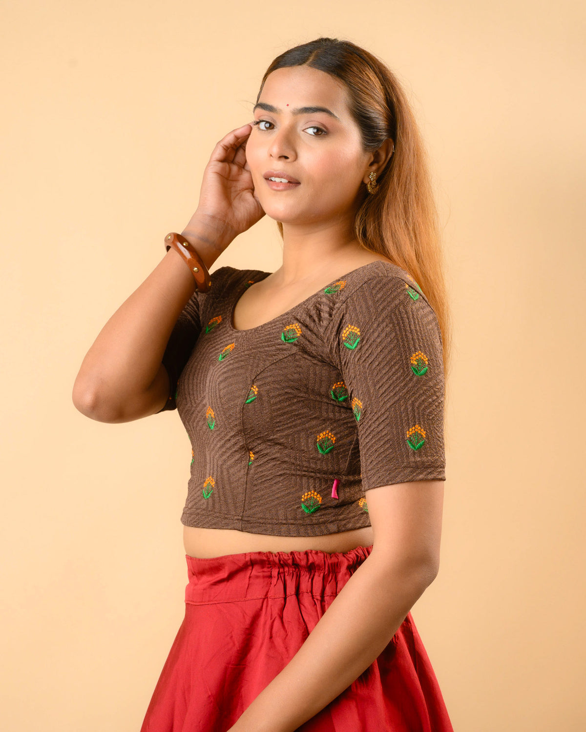 Side view of Keerti Coffee stretchable jacquard blouse with elbow sleeves by Advi - side