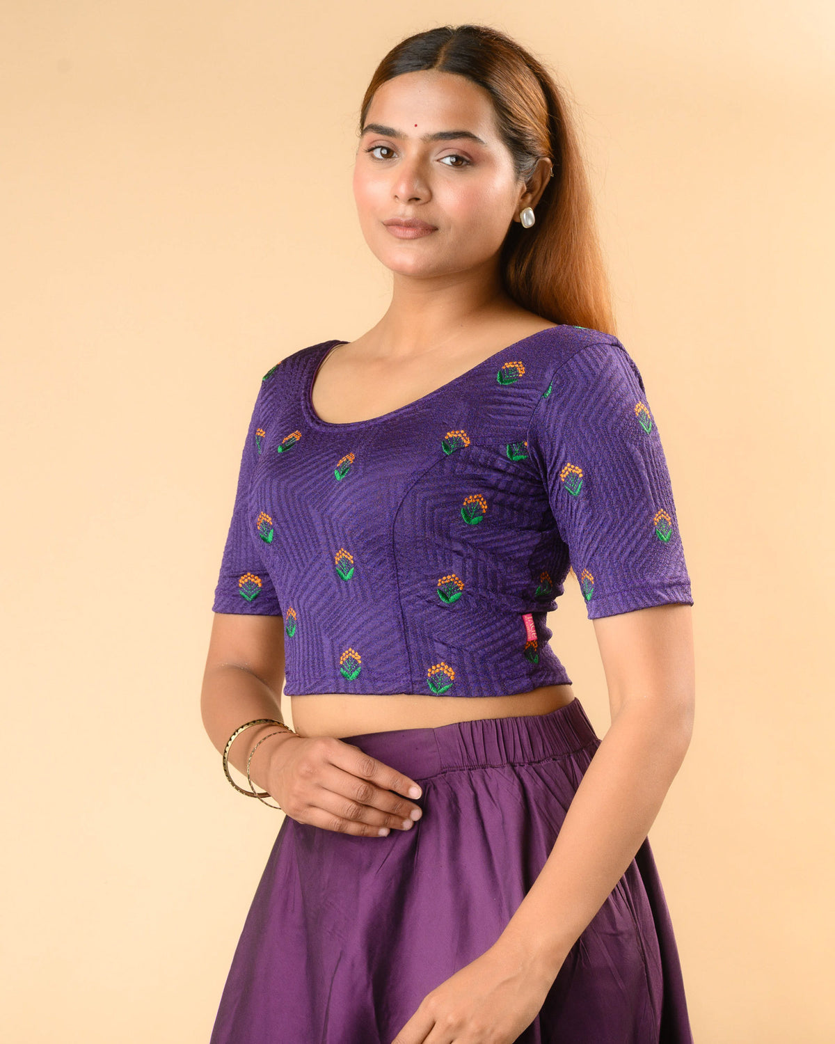 Side view of Keerti Purple stretchable jacquard blouse with elbow sleeves by Advi - side