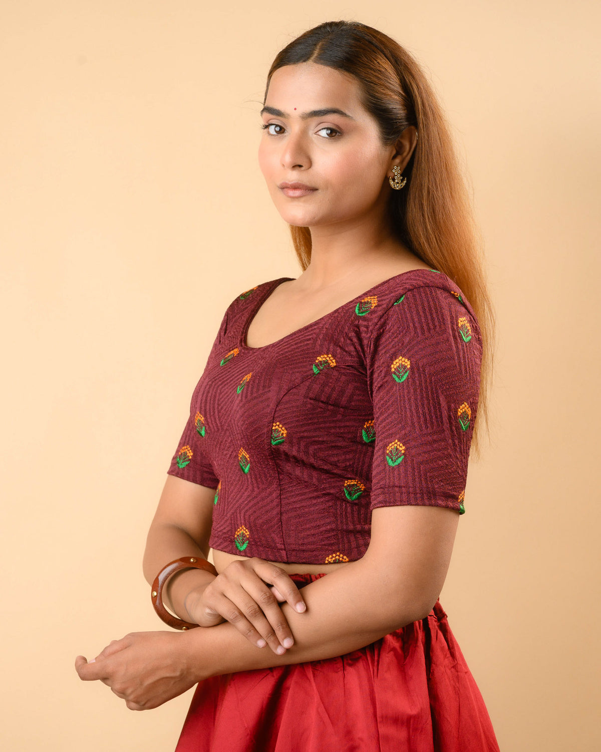 Side view of Keerti Wine stretchable jacquard blouse with elbow sleeves by Advi - side