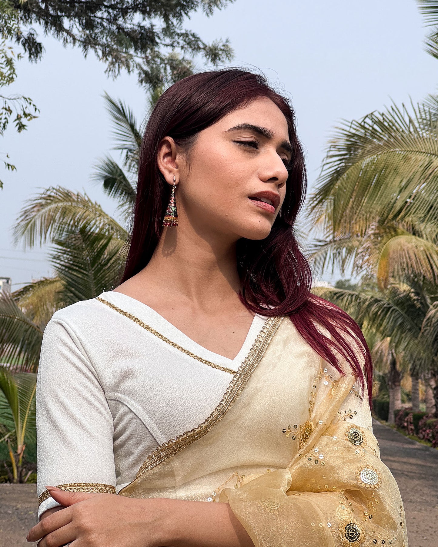 Nohreen Shimmering Solid V Neck Gold Lace Stretchable Slip On Blouse