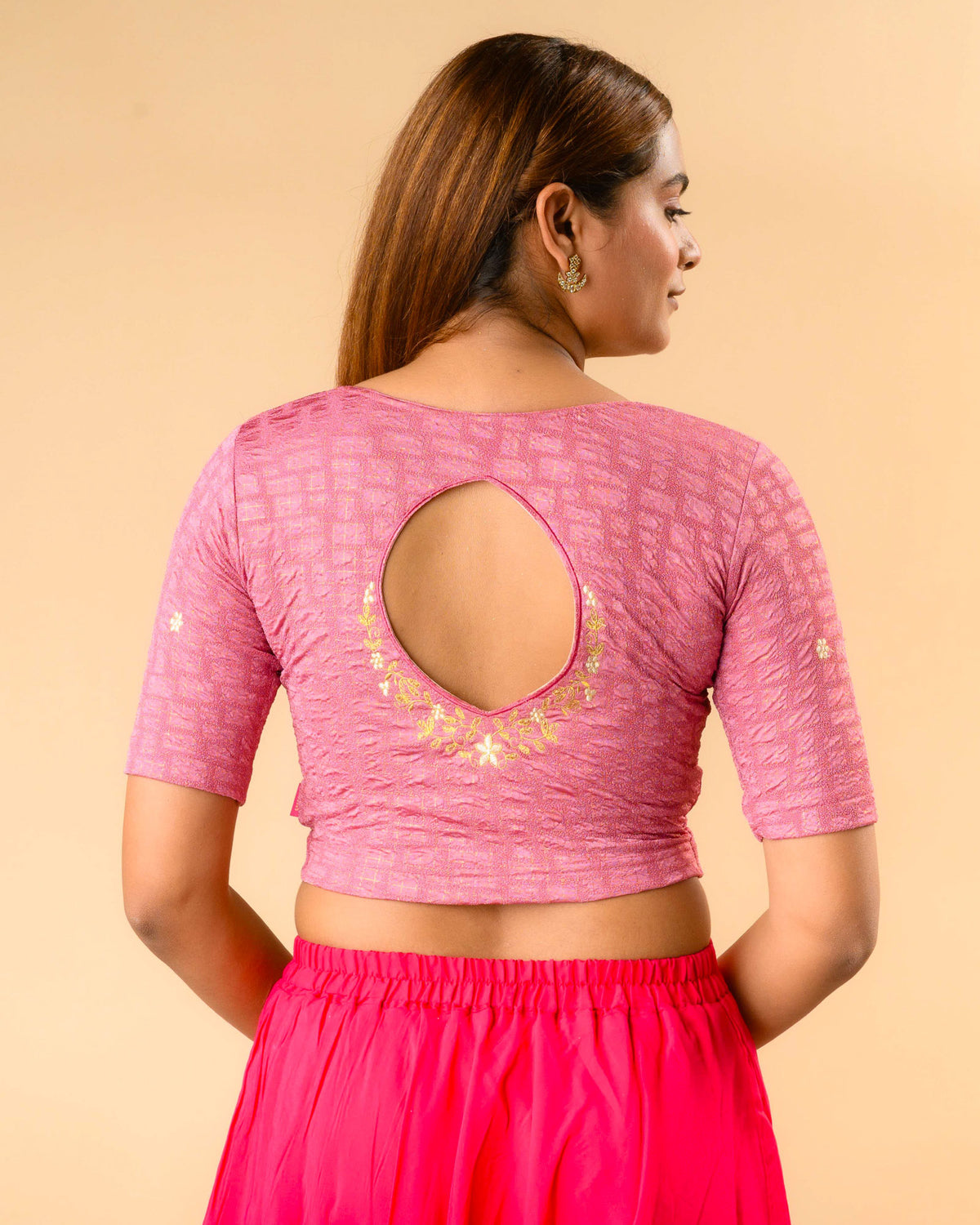 Yamini onion pink blouse with teardrop keyhole and gold zari floral border by Advi - back
