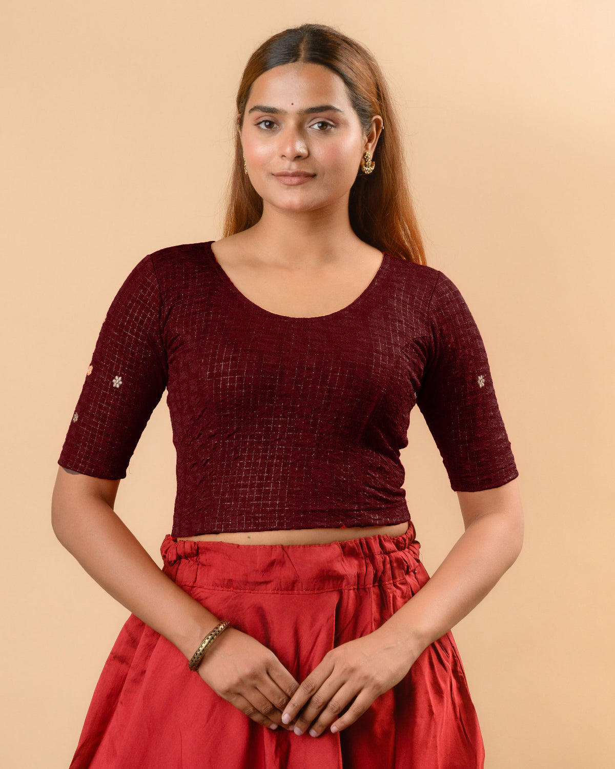 Yamini wine round neck stretch blouse with gold foil checks by Advi - front
